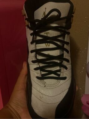 Jordan Women's White and Black High-Top Sneakers with Gold Accents